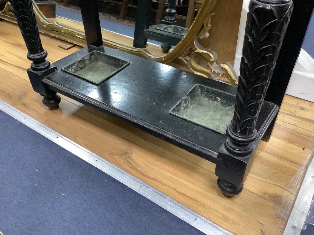 A late Victorian ebonised oak hallstand carved in Flemish style, length 77cm, depth 32cm, height 100cm